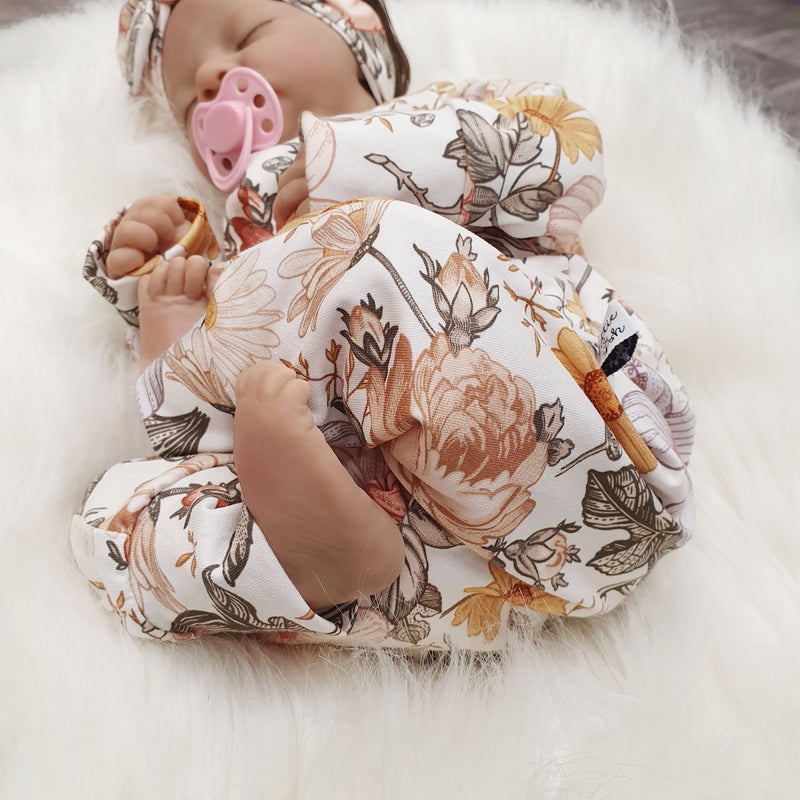 chamomile rose floral printed babygrow by Lottie & Lysh
