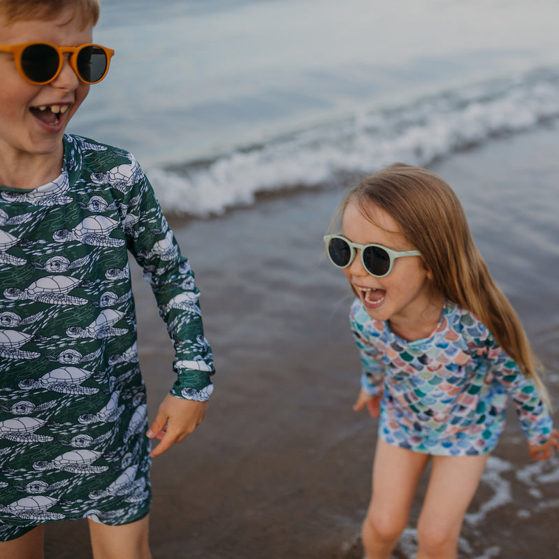 Surviving Summer Holidays: The Highs, Lows, and the Perfect Swimwear for Your Little Adventurers