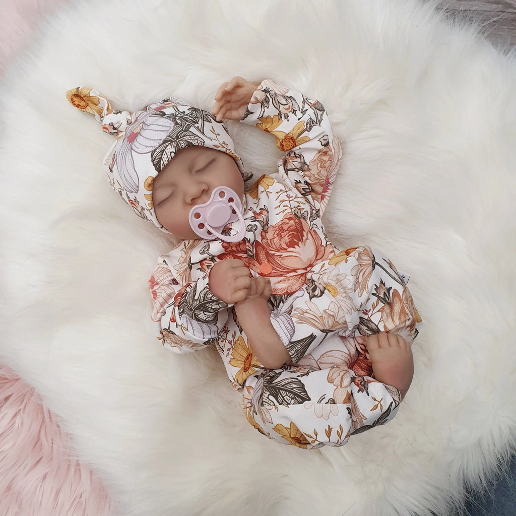 Floral Baby girl coming home outfit by Lottie & Lysh. Floral sleepsuit with matching baby hat