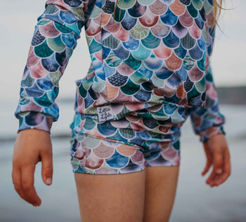 Infancy beachwear. Lottie & Lysh mermaid scales shorts and longsleeve swim top.