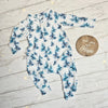 handmade baby romper featuring blue trees