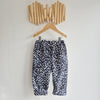 kids leopard print cord trousers in blue, black and white.