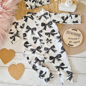 bow print baby romper by Lottie & Lysh