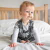 baby wearing elephant dungarees by Lottie & Lysh