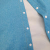 close up of denim look jersey fabric. Handmade kids clothing in the uk