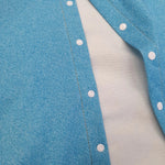 close up of denim look jersey fabric. Handmade kids clothing in the uk