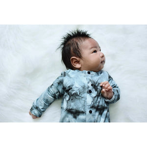 Newborn baby wearing tie dye effect romper made by lottie & lysh