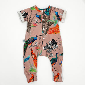 peacock printed pink babygrow for babies and toddlers. Handmade in the UK by Lottie & Lysh