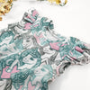 organic candy unicorns printed girls dress handmade by lottie and lysh in the Uk with shoulder ruffle detail