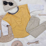 mustard long sleeve top, green grid leggings and accessories by Lottie & Lysh