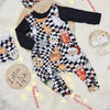 childrens christmas outfit flat lay image featuring lottie and lysh father christmas print baby and toddler dungarees, with matching bow headband and bib