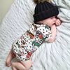 sleeping baby boy wearing lottie and lysh handmade clothing