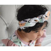 Baby girl wearing organic confetti frill should romper handmade by Lottie & Lysh UK with matching headband