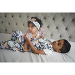 Baby girl wearing organic confetti frill should romper handmade by Lottie & Lysh UK