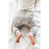 baby girl wearing Lottie & Lysh blush floral baby and toddler leggings with bare feet
