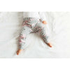 Product image of a baby girl wearing Lottie & Lysh floral blush leggings