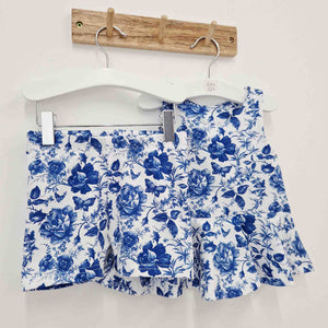 toddler girls clothing made in the uk. Blue and white floral peplum top and cycling shorts set